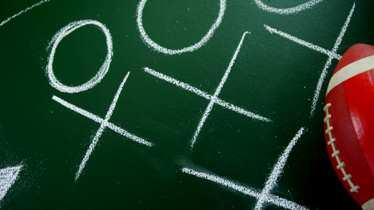 palla da rugby su tavola di strategia 4k