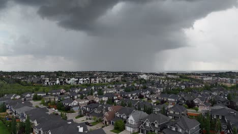 thunderstorms rolling in over the suburbs of calgary, alberta in summer