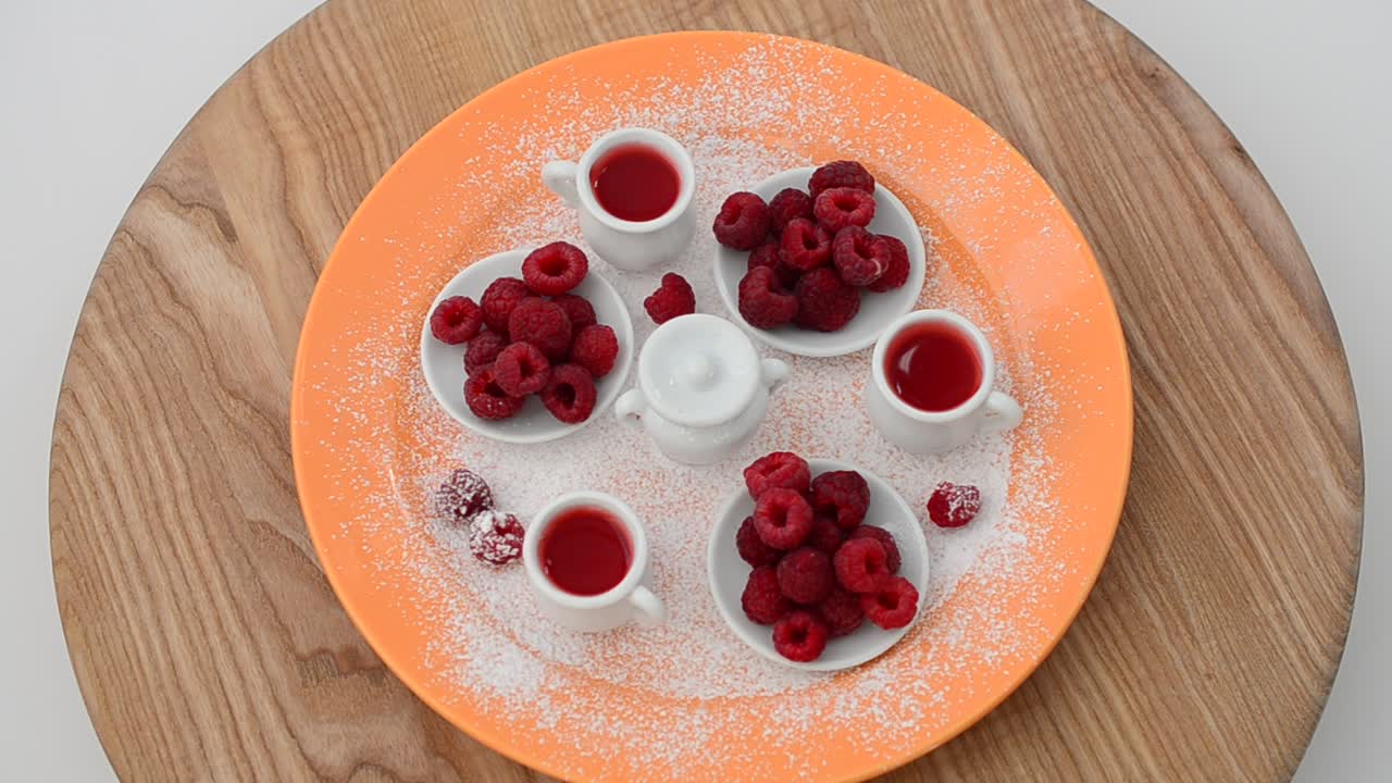 Raspberry and jam, still life. Shooting in the movement