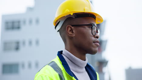 Black-man,-architect-and-hard-hat-in-city