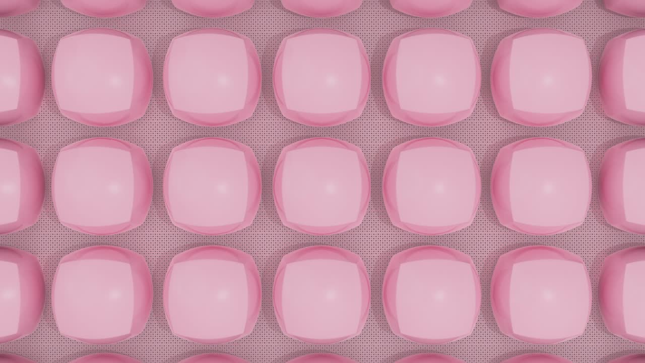 テクスチャのある表面に並んだパステルカラーの滑らかな楕円