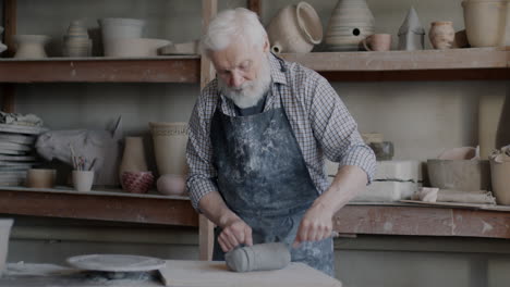 senior potter in studio