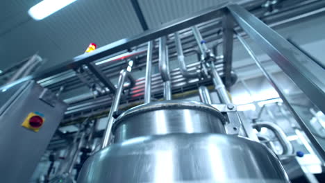 milk factory production. factory industrial tubes used in a manufacturing process.