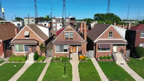 Woman-exiting-front-door-of-old-home-outside-of-large-American-city