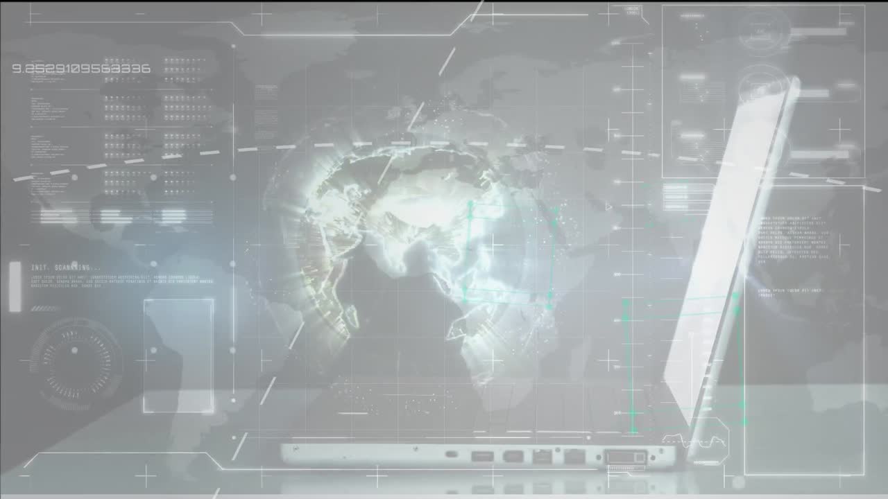 Interface with spinning globe and data processing against hands of a person using laptop