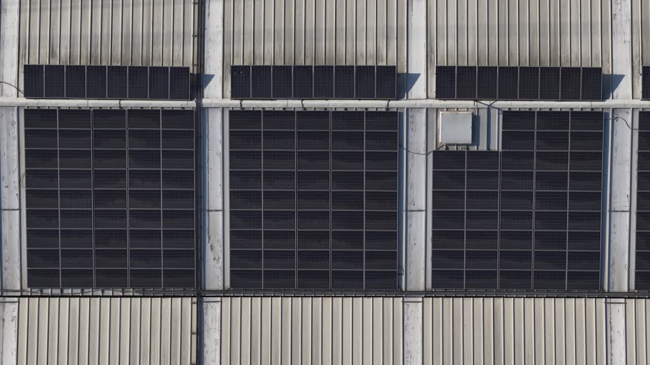 Solar panels on the top of warehouse rooftops