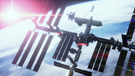 vista de la tierra y la estación espacial internacional está orbitando la tierra
