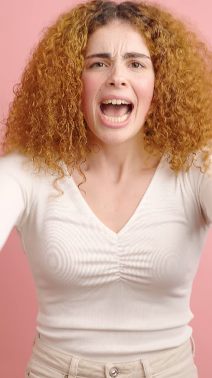 Woman expressing different levels of anger on pink background