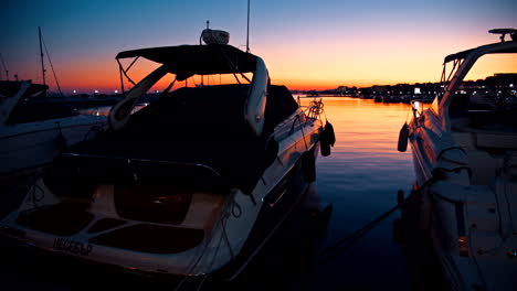 yachts on the pier at sunset