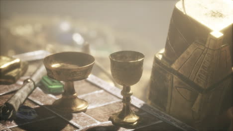 copas de oro y cofre del tesoro en un entorno de fantasía