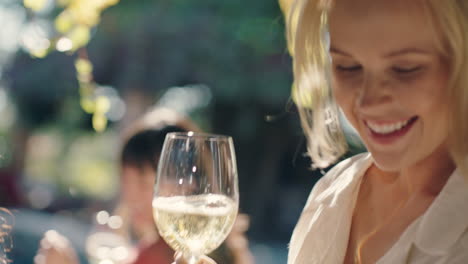 two-beautiful-woman-dancing-with-friends-at-summer-dance-party-drinking-wine-enjoying-summertime-social-gathering-having-fun-celebrating-on-sunny-day-4k-footage