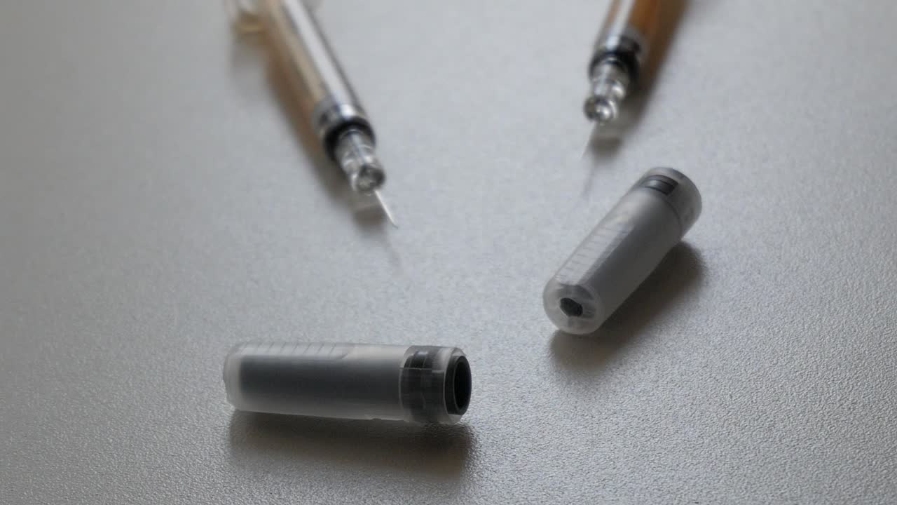Close up shot of syringes and containers