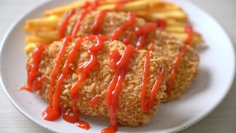 fried chicken breast fillet steak with french fries and ketchup