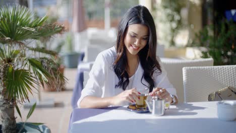 Woman-Waiting-For-Friend-In-Cafe