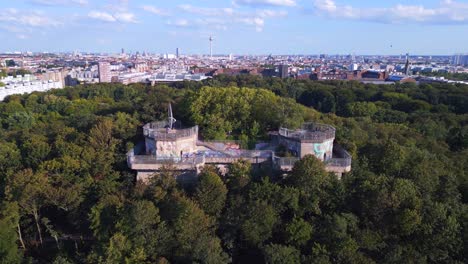 dramatic aerial top view flight flak tower humboldthain bunker world war 2, berlin mitte summer 2023