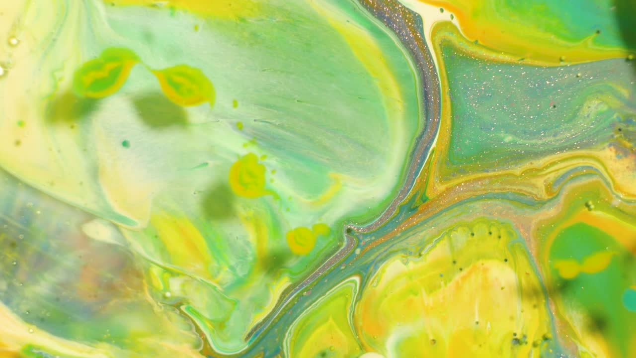 movimiento abstracto de pinturas acrílicas. vista desde arriba. increíbles patrones de mezcla de colores