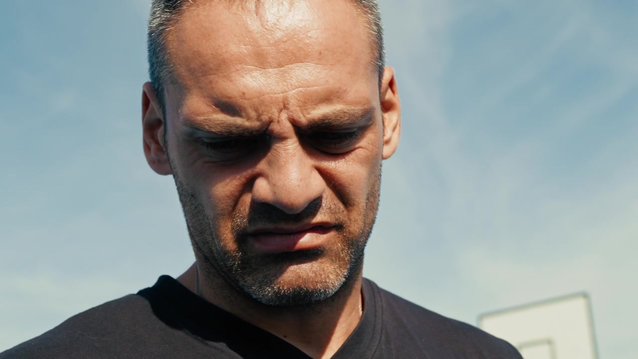 expression of fatigue on a man’s face
