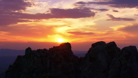 sunset through the rocks