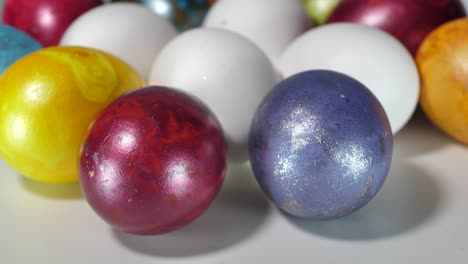 colored eggs rotate in a basket