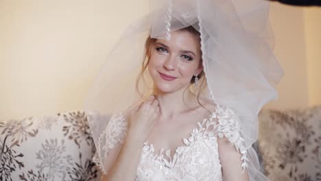 beautiful bride in white dress with veil