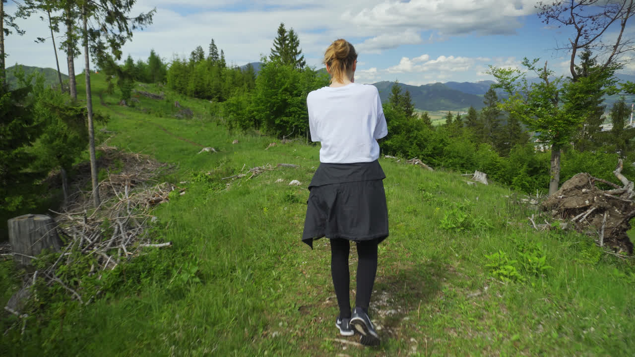 Lone Climber Strolling In A Mountain Range Close By The Slovak-Czech Border. Rear Follow-Full Shot