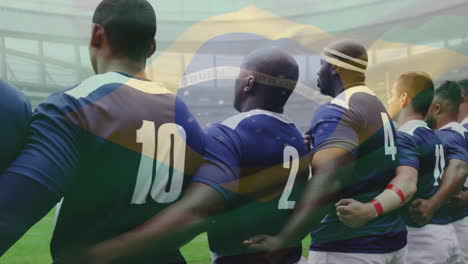 animation of flag of brazil over diverse male rugby players singing anthem at stadium