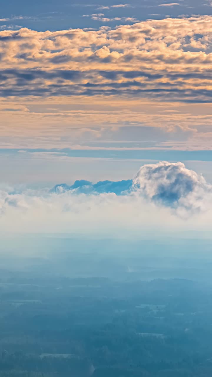Aerial hyperlapse of moving clouds from above, vertical natural background