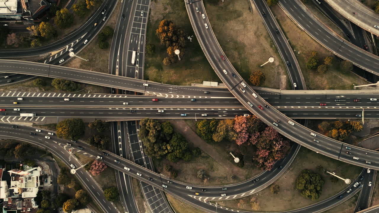 Aerial View of Busy Highway Interchange with Moving Traffic