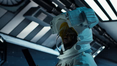 vertical video astronaut researcher wearing equipment using tablet to carry out research