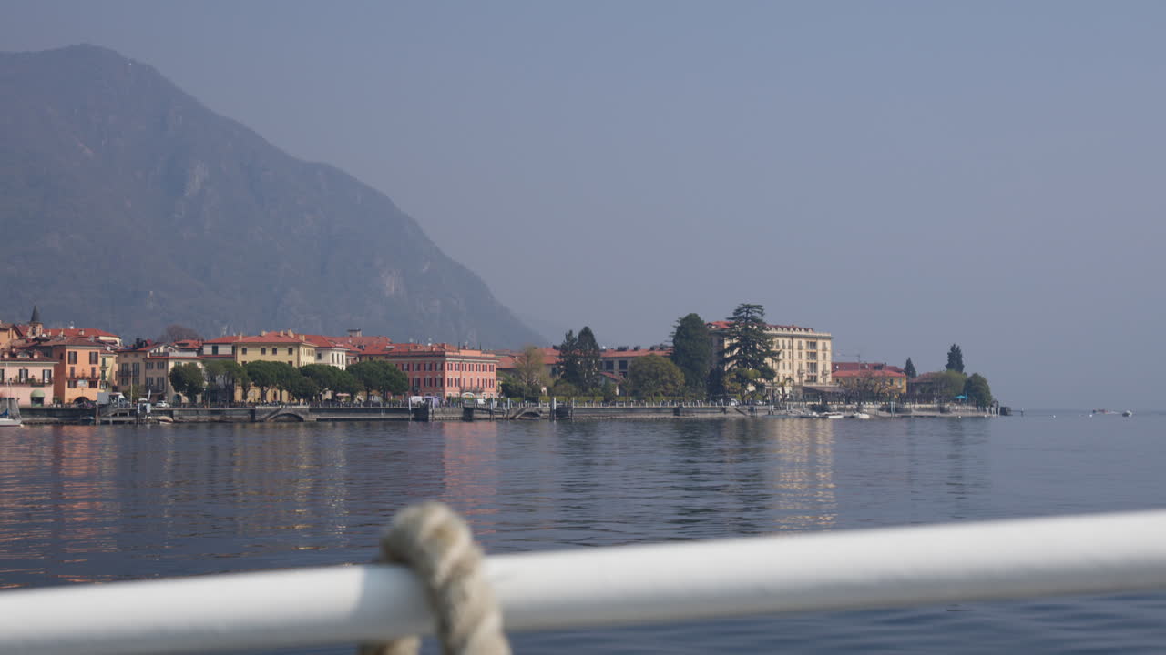 Lakeside Hotels Across The Lake Como Near Bellagio, Italy. POV Shot