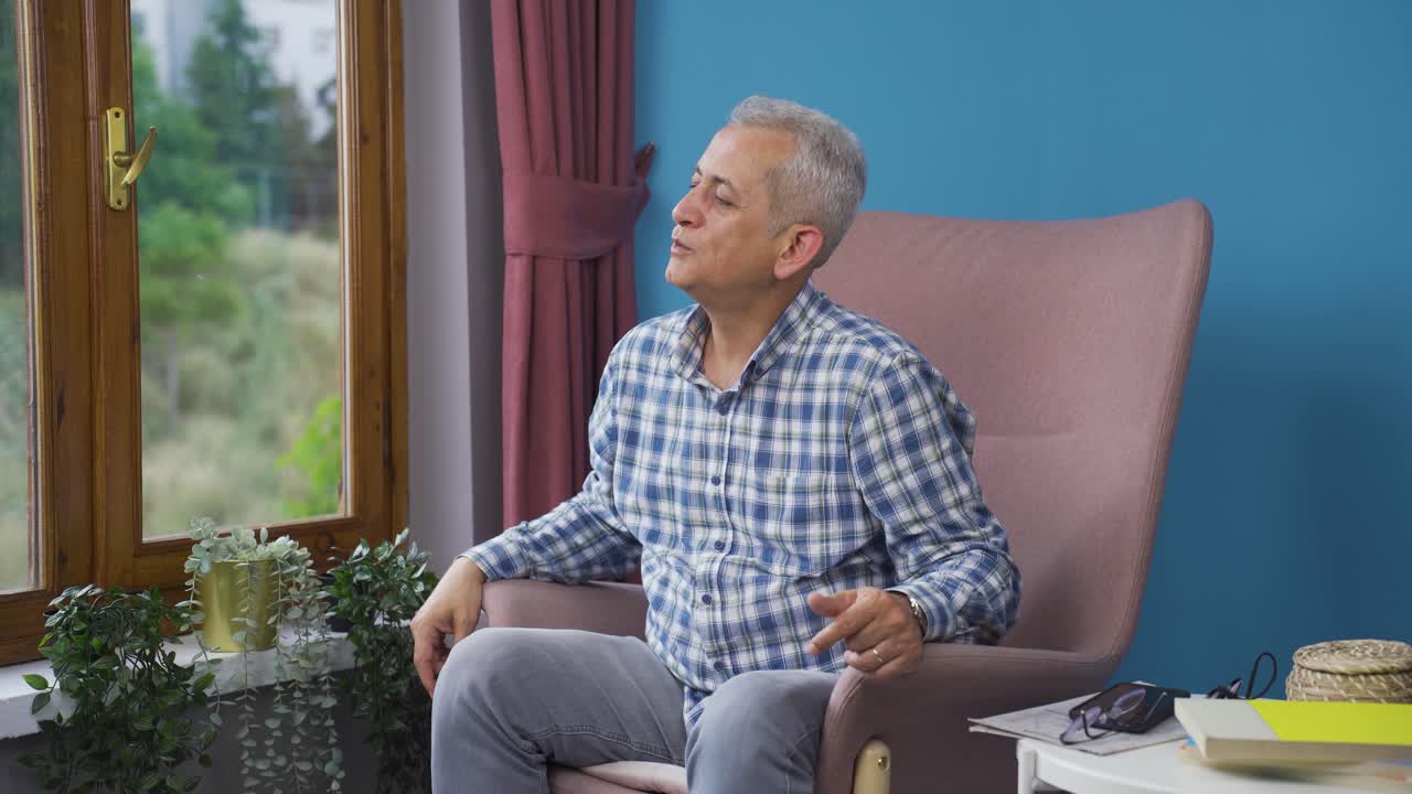 Premium stock video Happy man dancing at home.