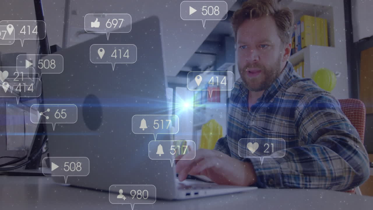 content creator typing on laptop while social media marketing icons floating around workspace