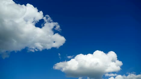 clouds are moving in the blue sky. timelapse
