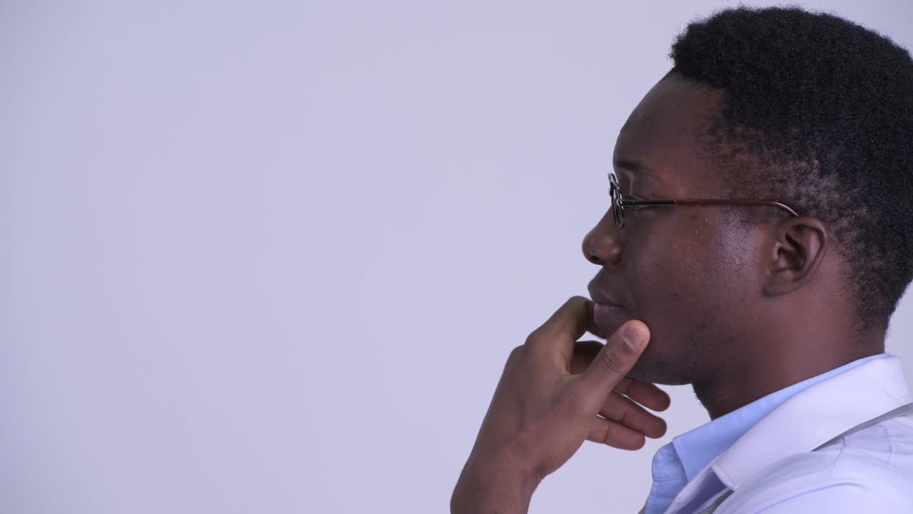 Young handsome African man doctor