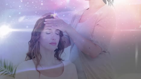 animation of stars and galaxy moving over caucasian woman healing female customer