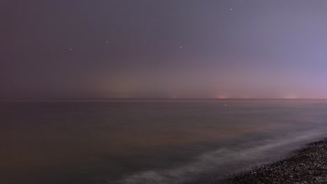 night black sea long exposure timelapse along the coastline