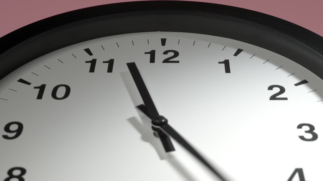 Clock Face on Rosy Rose Pink Wall in Time Lapse