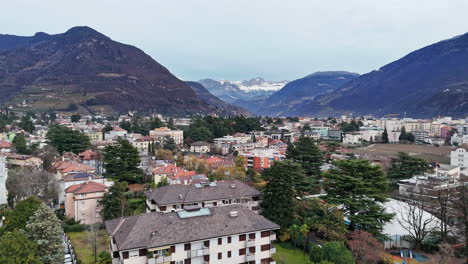 aerial view of city with mountains in background