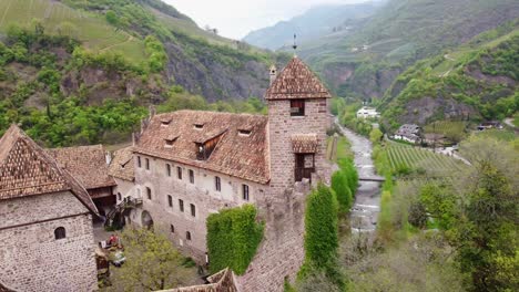 aerial footage of roncolo castle, showcasing scenic views and medieval walls.