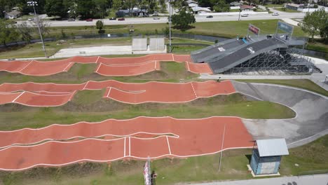 side view of a bmx pump track via drone