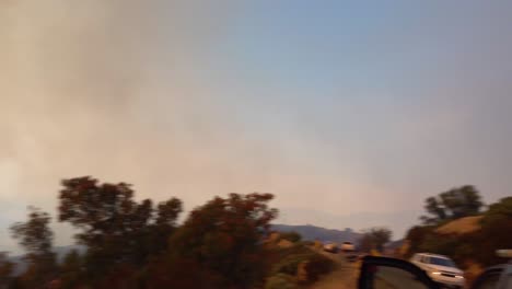 Firefighters-Look-On-As-A-Fast-Moving-Brush-Fire-Burns-Up-A-Hillside-In-Southern-California-During-The-Cave-Fire-In-Santa-Barbara