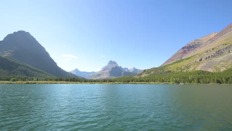 sinopah mountain viewed at the end of two medicine lake in glacier national park