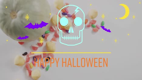 Animation-of-happy-halloween-text-over-bats,-pumpkin-and-sweets