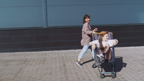 friends having fun with shopping cart