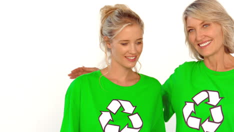 two women wearing green shirt for the environment