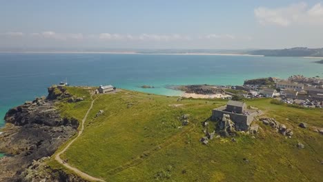 Cornish-coastal-town,-popular-summer-tourist-destination-and-beach,-aerial-view