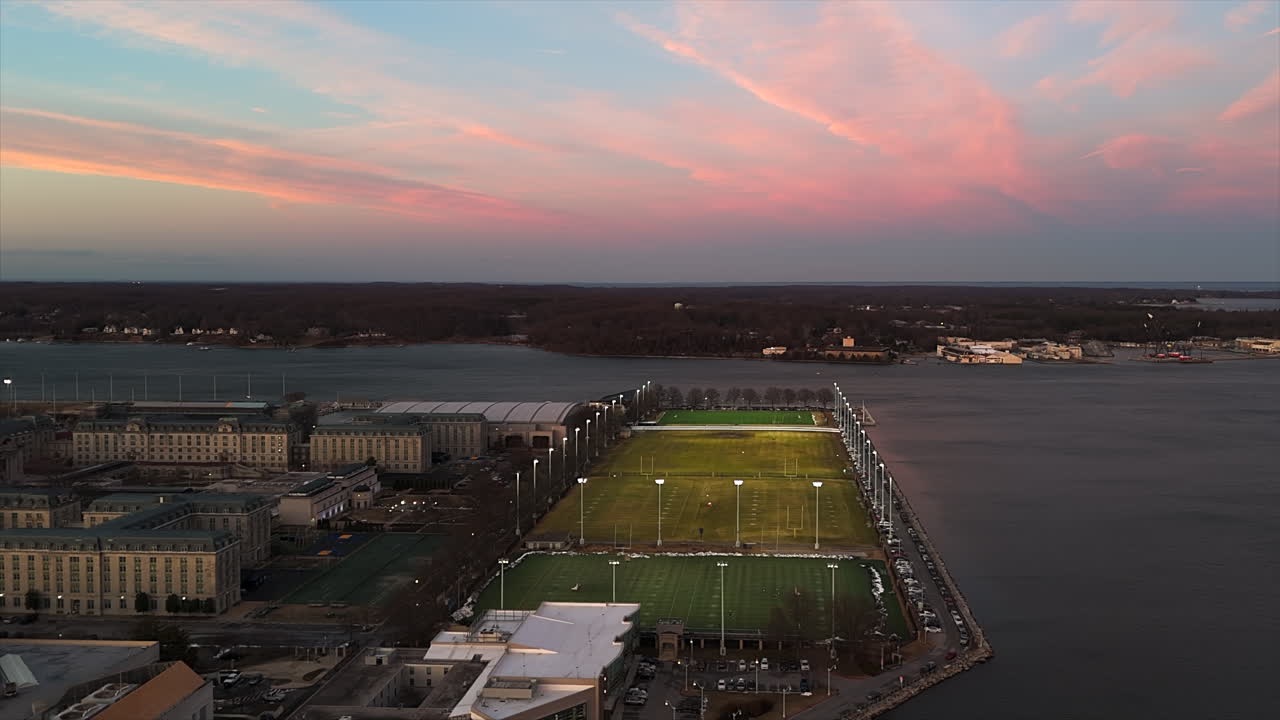 Sunset View Of Rip Miller Lacrosse Field At The United States Naval Academy Military School In Annapolis, Maryland, USA. Aerial Shot