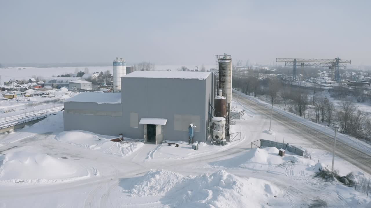 Industrial Facility in Snowy Landscape