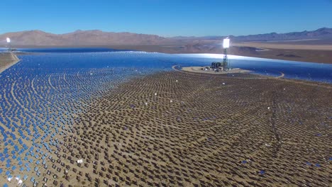 a beautiful aerial over a vast concentrated solar power farm in the mojave desert 5