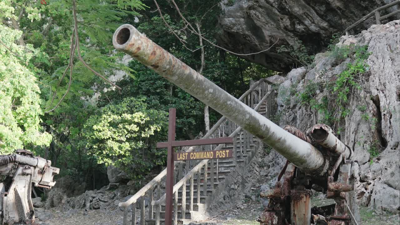 Pan shot of a war cannon at the Last command post - Marpi, Saipan, Northern Mariana Islands